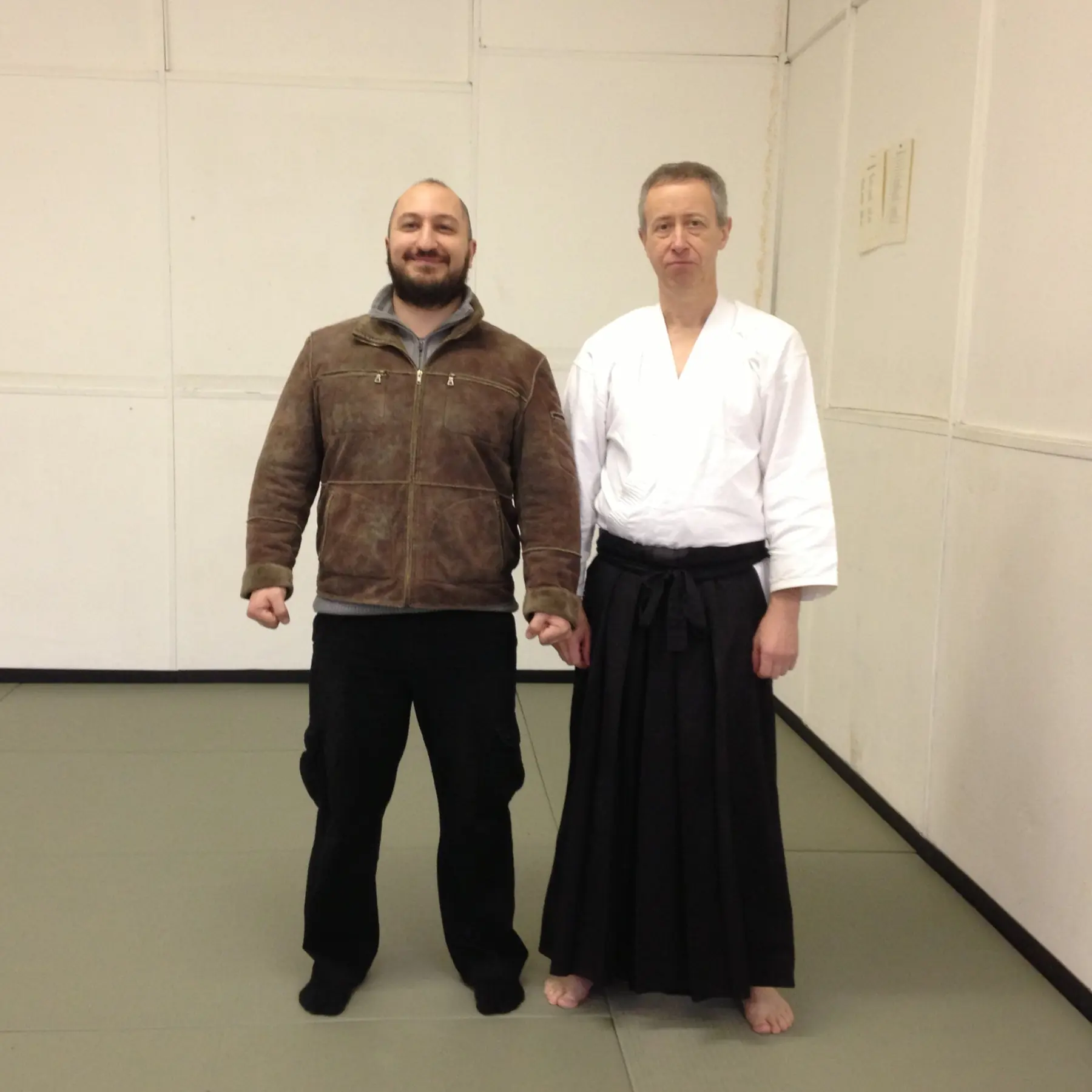 Olgun Tiltay learning Bokken and Bo from Simon Thackeray Sensei Aikido [6th Dan]